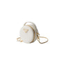White round pouch with gold accents on a light gray background