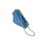 Blue handbag with a chain strap on a light gray background