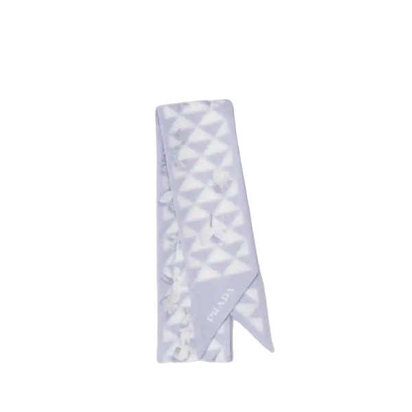 Light purple scarf with geometric pattern on a light gray background
