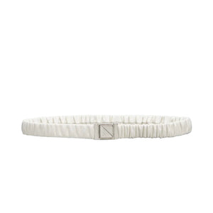 White belt with a silver buckle on a light gray background