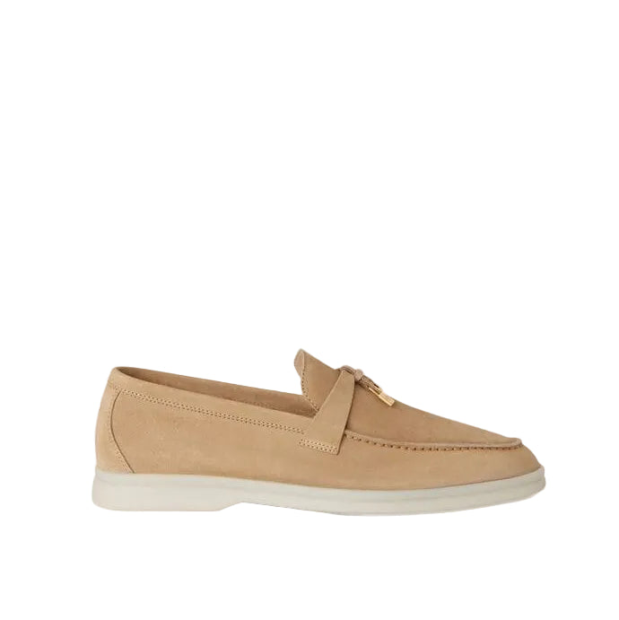 Tan suede loafer shoe on a white background