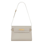 Beige handbag with gold accents on a white background