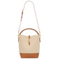 Beige and brown handbag with gold accents on a white background