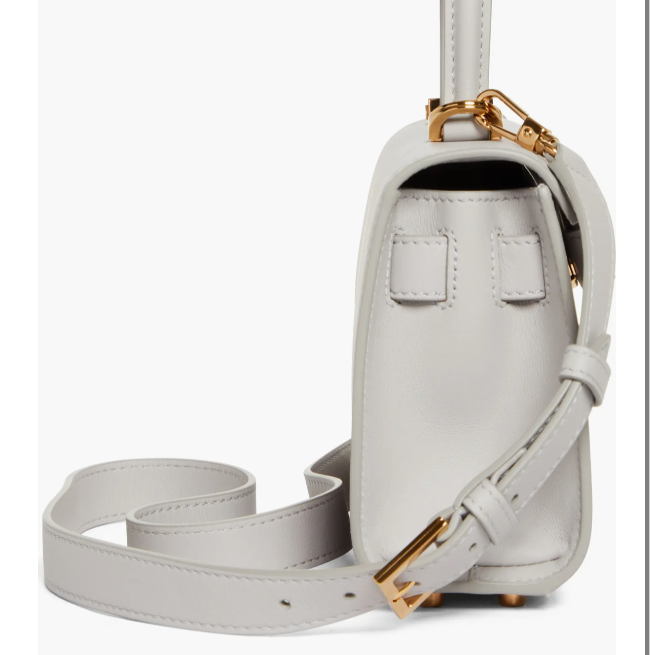 White backpack with gold accents 