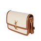 Beige handbag with brown leather accents and a gold logo on a white background