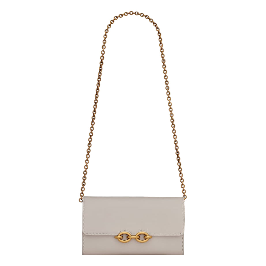 Beige handbag with gold chain strap on a white background