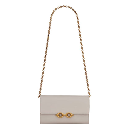 Beige handbag with gold chain strap on a white background