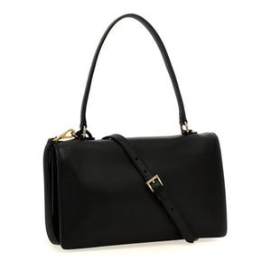 A black leather handbag with a structured rectangular shape, a single top handle, a detachable shoulder strap, and gold-tone hardware, shown on a plain white background.