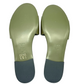 Gold shoe insoles with 'Fendi' branding on a white background