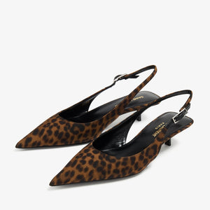 Pair of leopard print slingback shoes on a white background