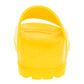 Yellow slip-on shoe with a white background