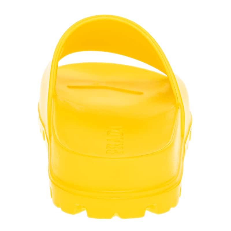 Yellow slip-on shoe with a white background