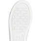 White sneaker sole with a diamond pattern on a white background