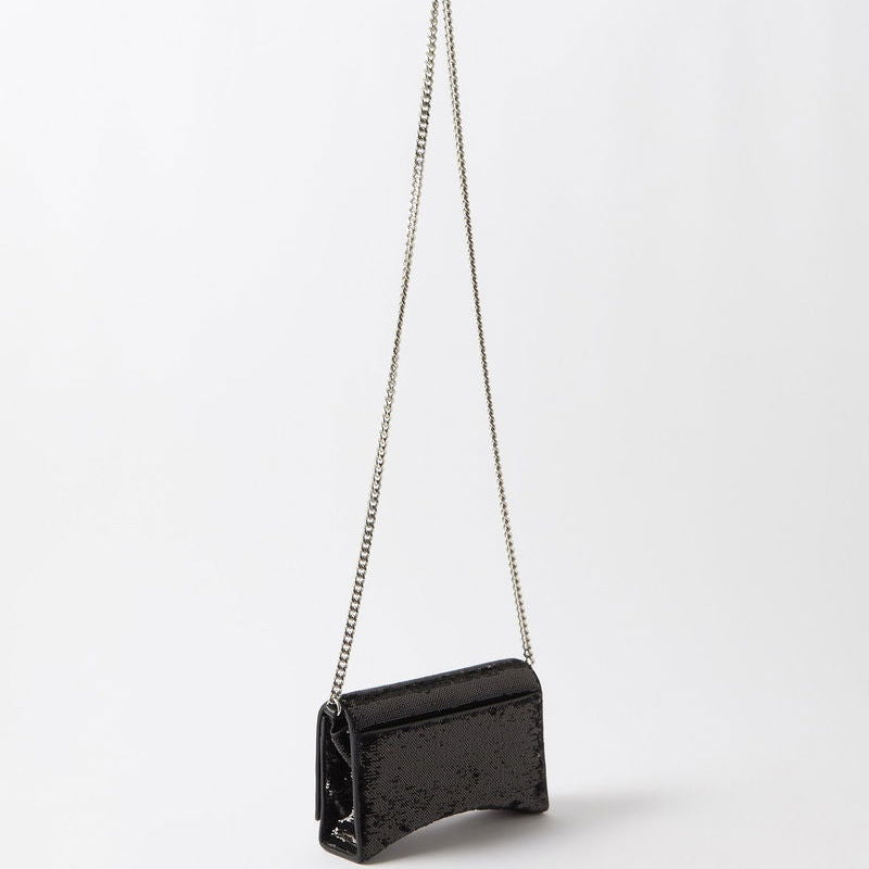 Black handbag with a chain strap on a white background