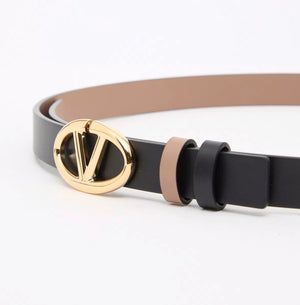 Belt with gold buckle on a white background