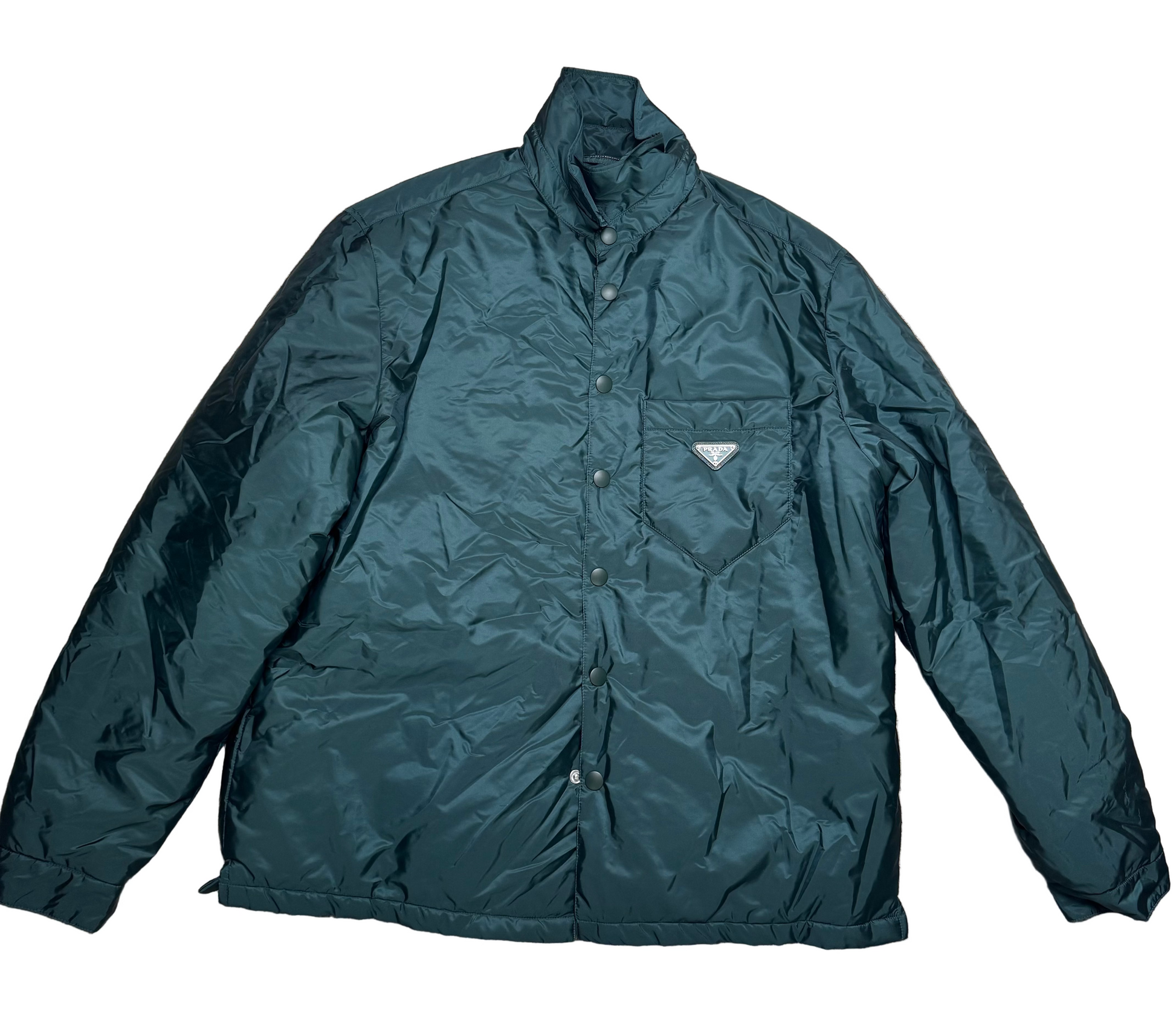 Green jacket on a beige carpet