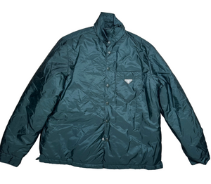 Green jacket on a beige carpet