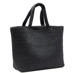 Black woven tote bag on a white background