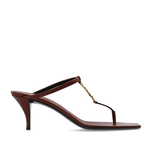 Brown high-heeled sandal with a thin strap on a white background