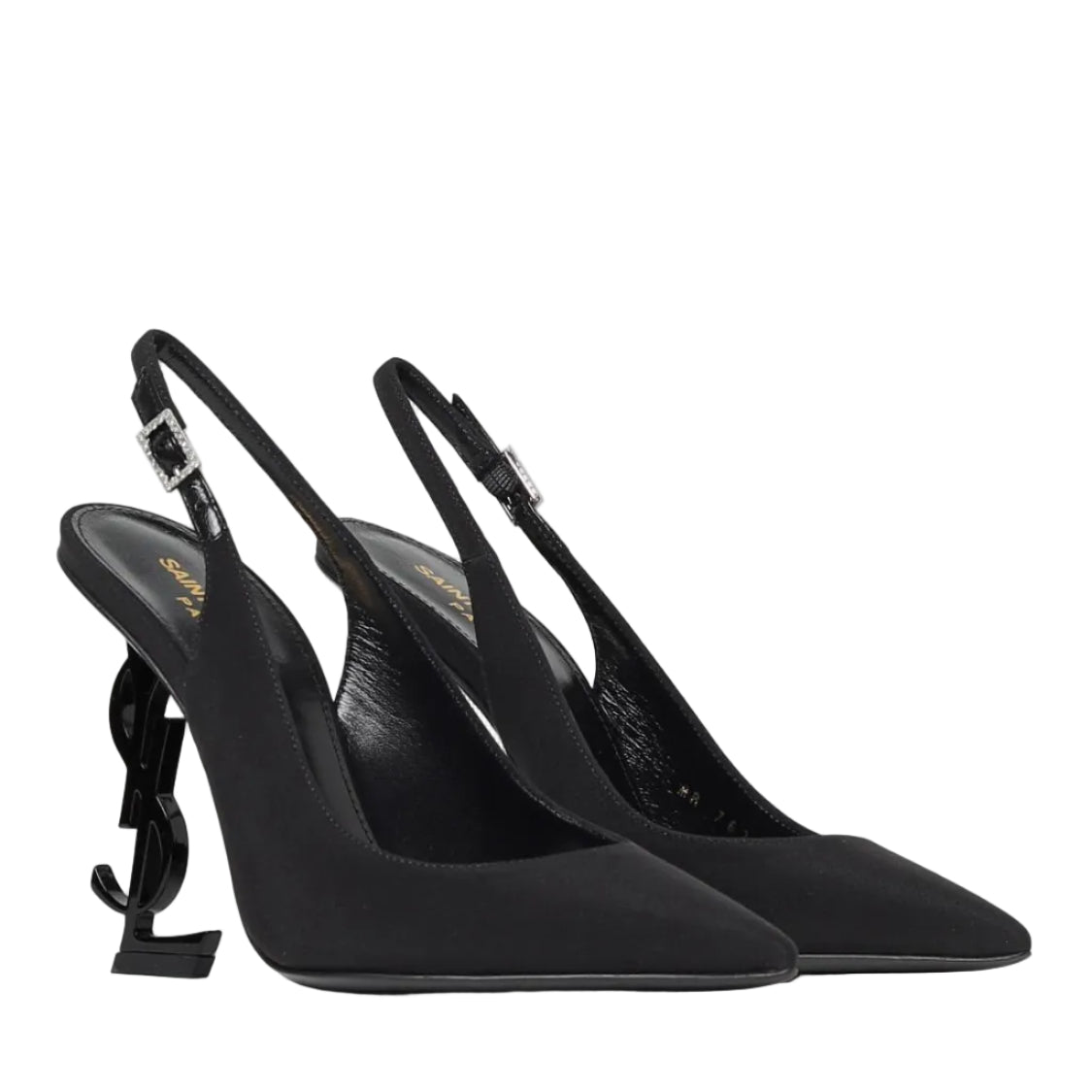 Pair of black high-heeled slingback shoes on a light gray background