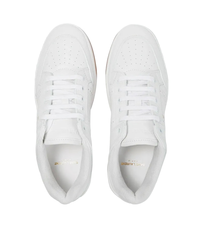 White sneakers on a light gray background