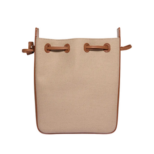 Beige handbag with brown accents on a white background
