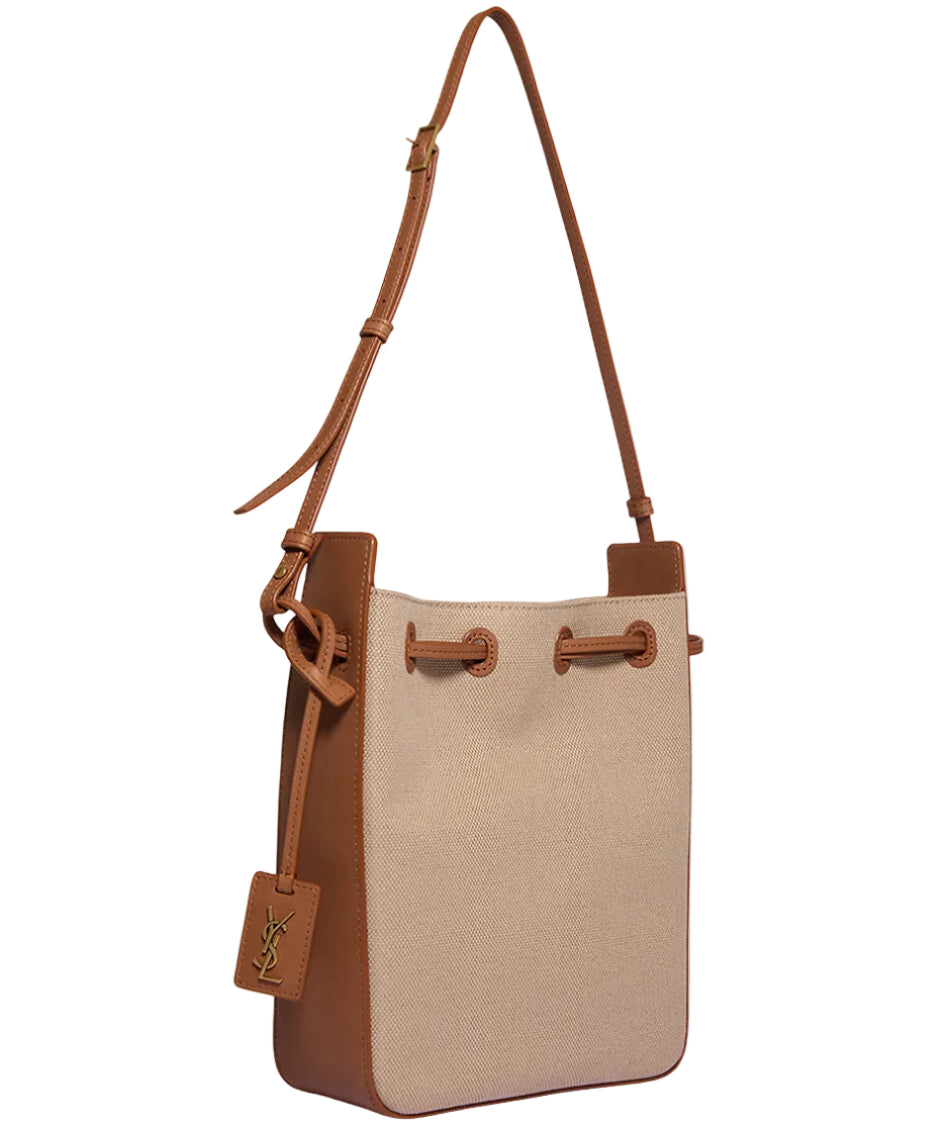Beige handbag with brown accents on a white background