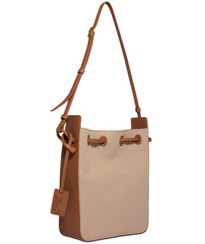 Beige handbag with brown accents on a white background
