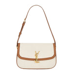 White handbag with brown accents and a gold logo on a white background