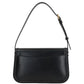 Black handbag with a strap on a white background