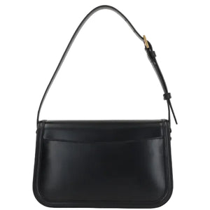 Black handbag with a strap on a white background