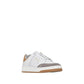 White sneaker with brown accents on a white background