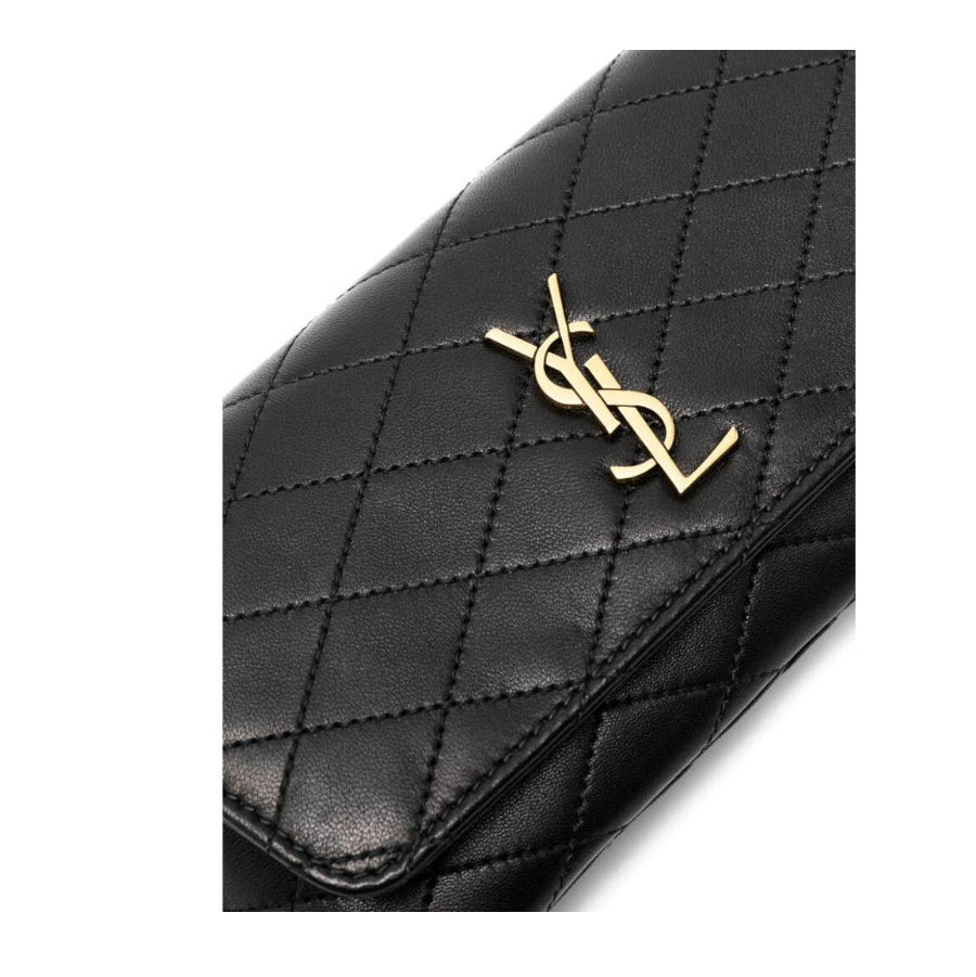 Black quilted handbag with gold logo on a white background