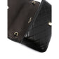 Black quilted handbag with gold accents on a white background