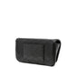 Black quilted handbag on a white background