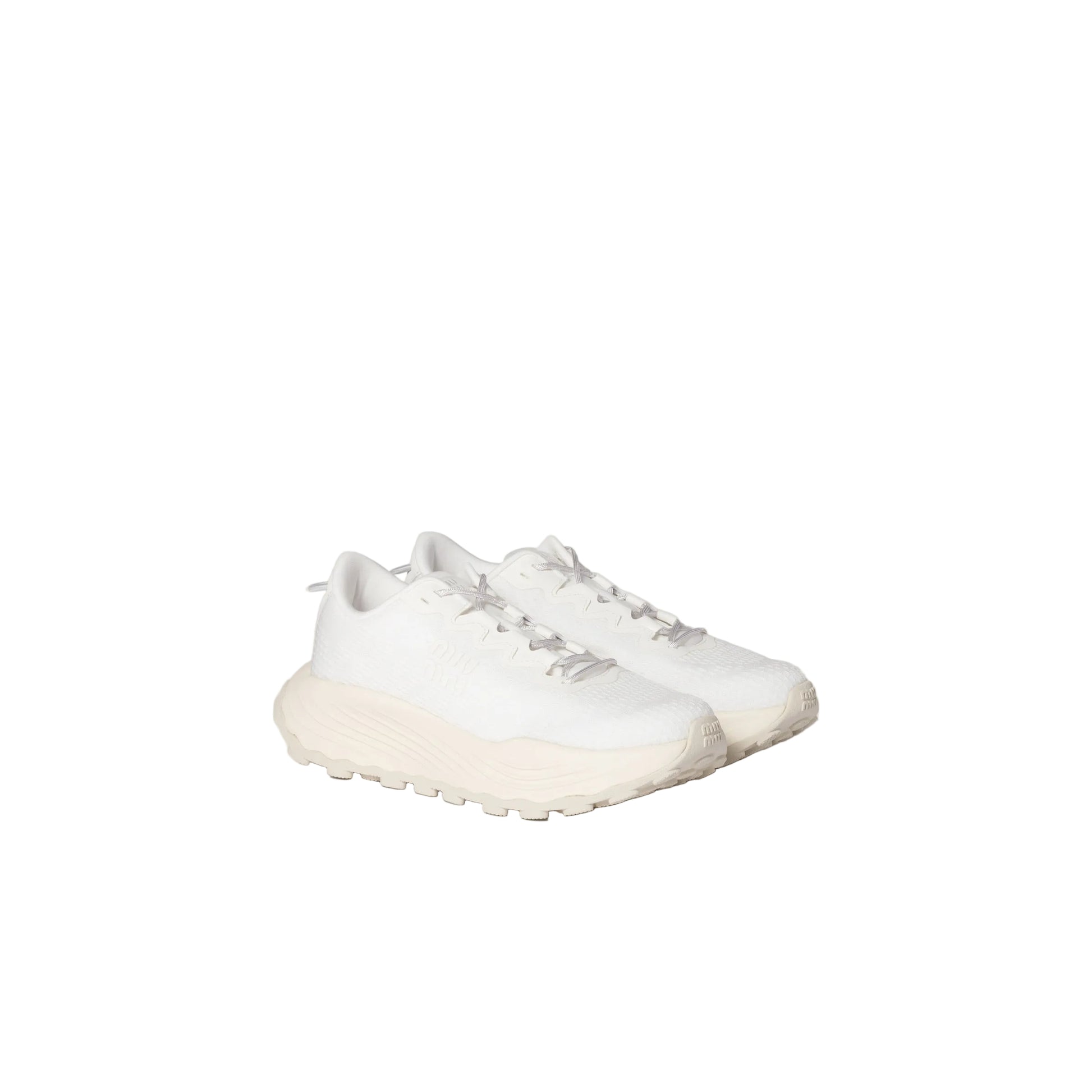 White sneakers on a light gray background