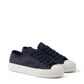 Navy blue sneakers with white soles on a white background