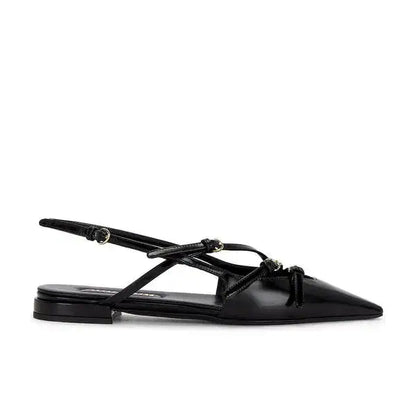 Black sandal with a thin strap on a white background