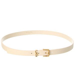 Beige belt with a gold buckle on a white background