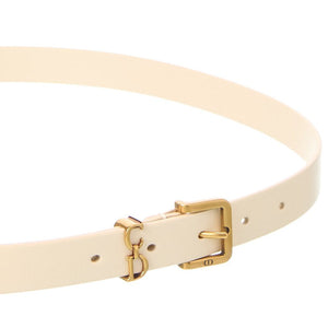 Beige belt with a gold buckle on a white background