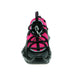 Pink and black athletic shoe on a white background