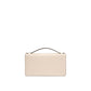 Beige handbag with a black handle on a white background