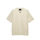Beige t-shirt on a white background