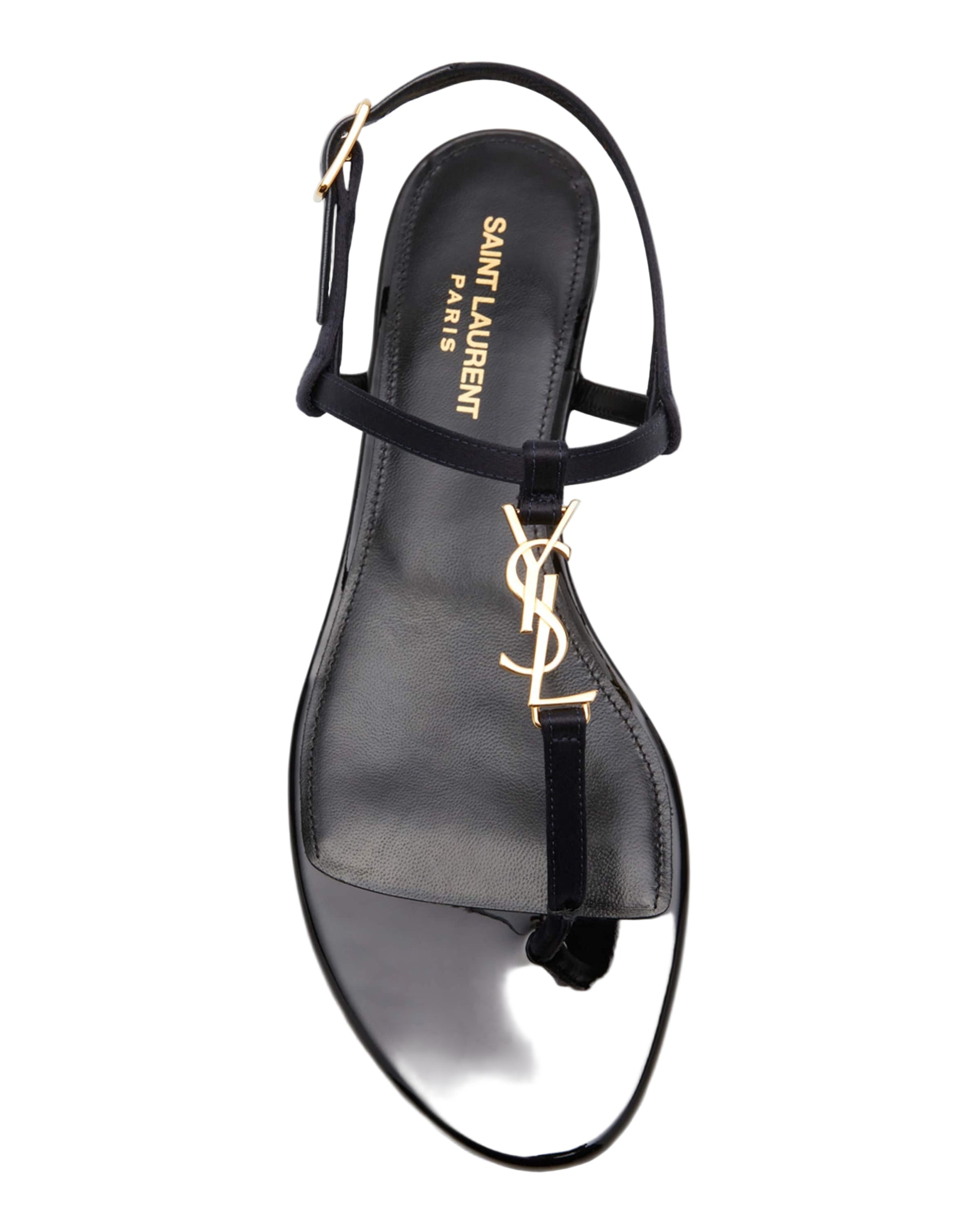 Black sandal with gold logo on a white background