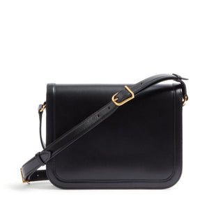 Black leather handbag with a gold buckle on a white background