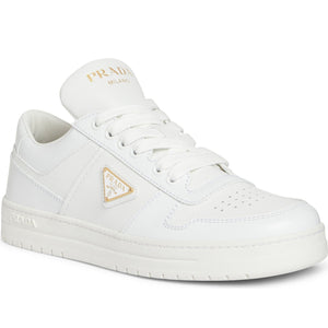 White sneaker with Prada logo on a white background