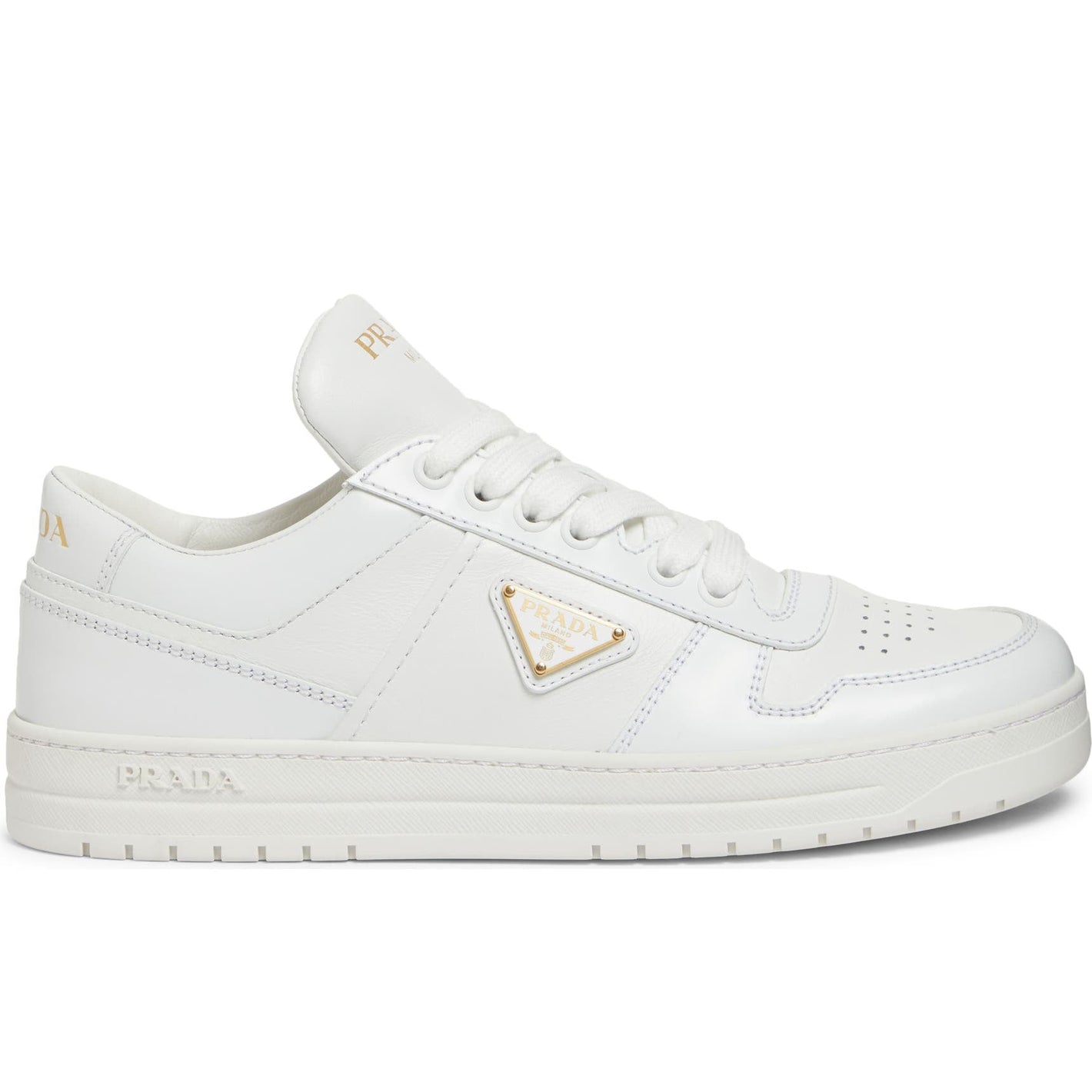 White sneakers with a gold triangle logo on a white background
