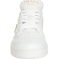 White sneaker with gold Prada logo on a white background