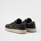 Black Prada sneakers on a white background