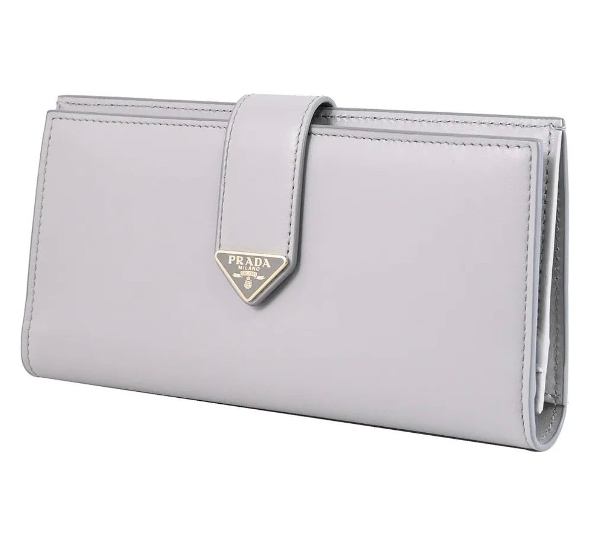 Gray wallet with Prada logo on a white background